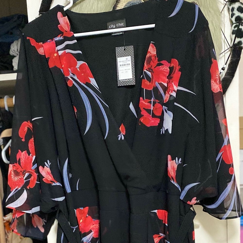 Faux wrap bodice & draped skirt, this stunning style is perfect for any occasion